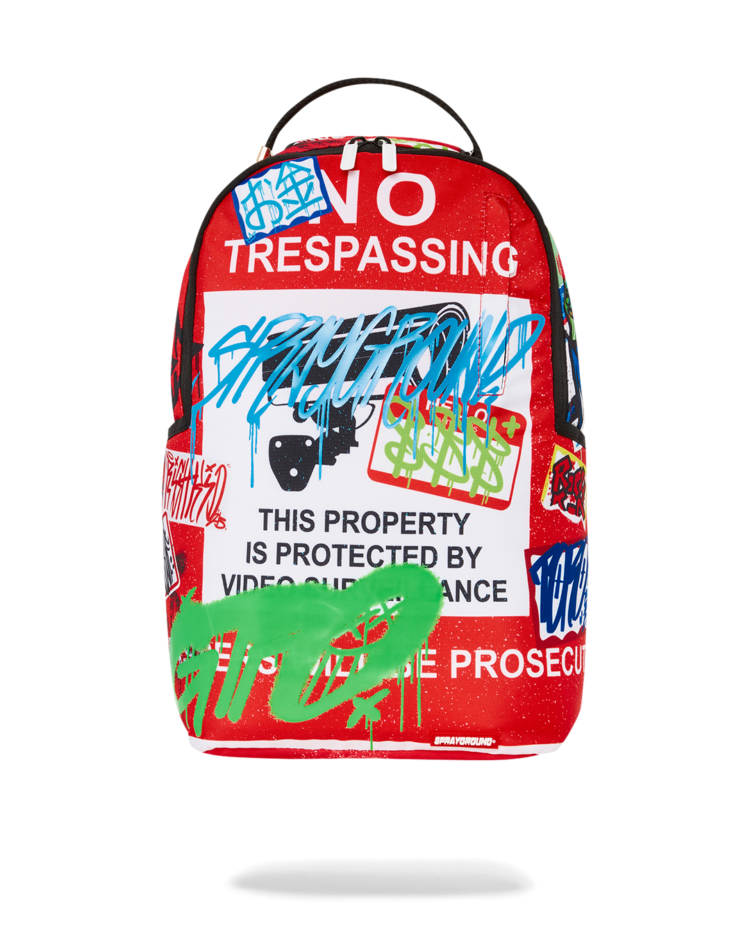 Front angle of Sprayground backpack with gold zippers and urban backdrop