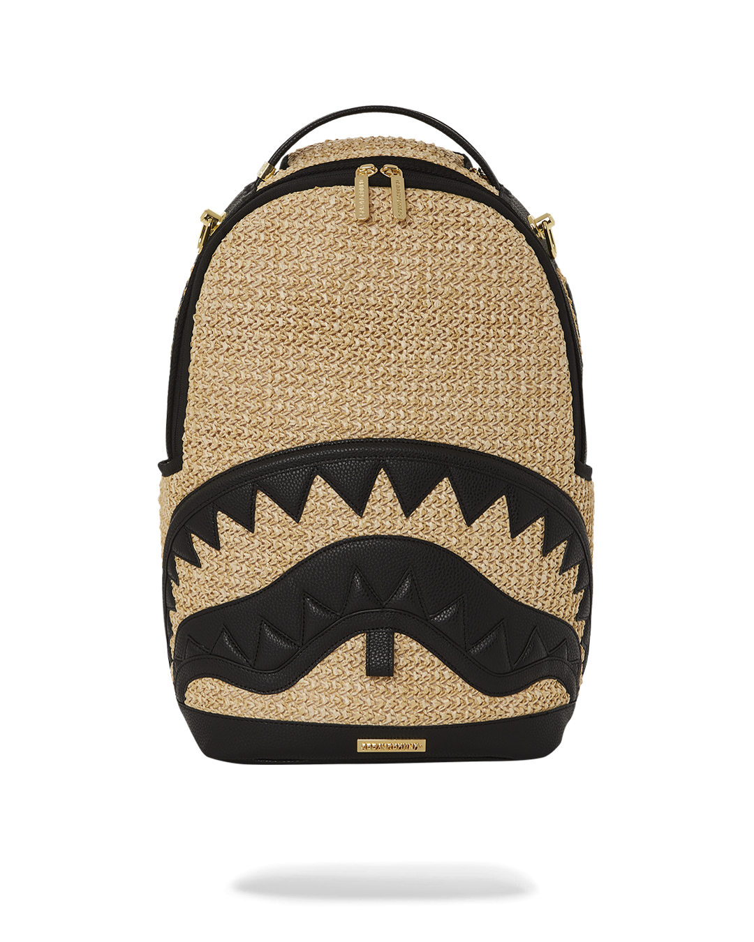 Front view of the pink Sprayground backpack showcasing shark mouth design.
