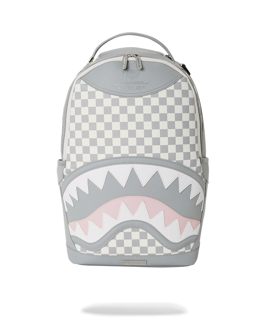 JetSet backpack on a work desk with laptop and notebook