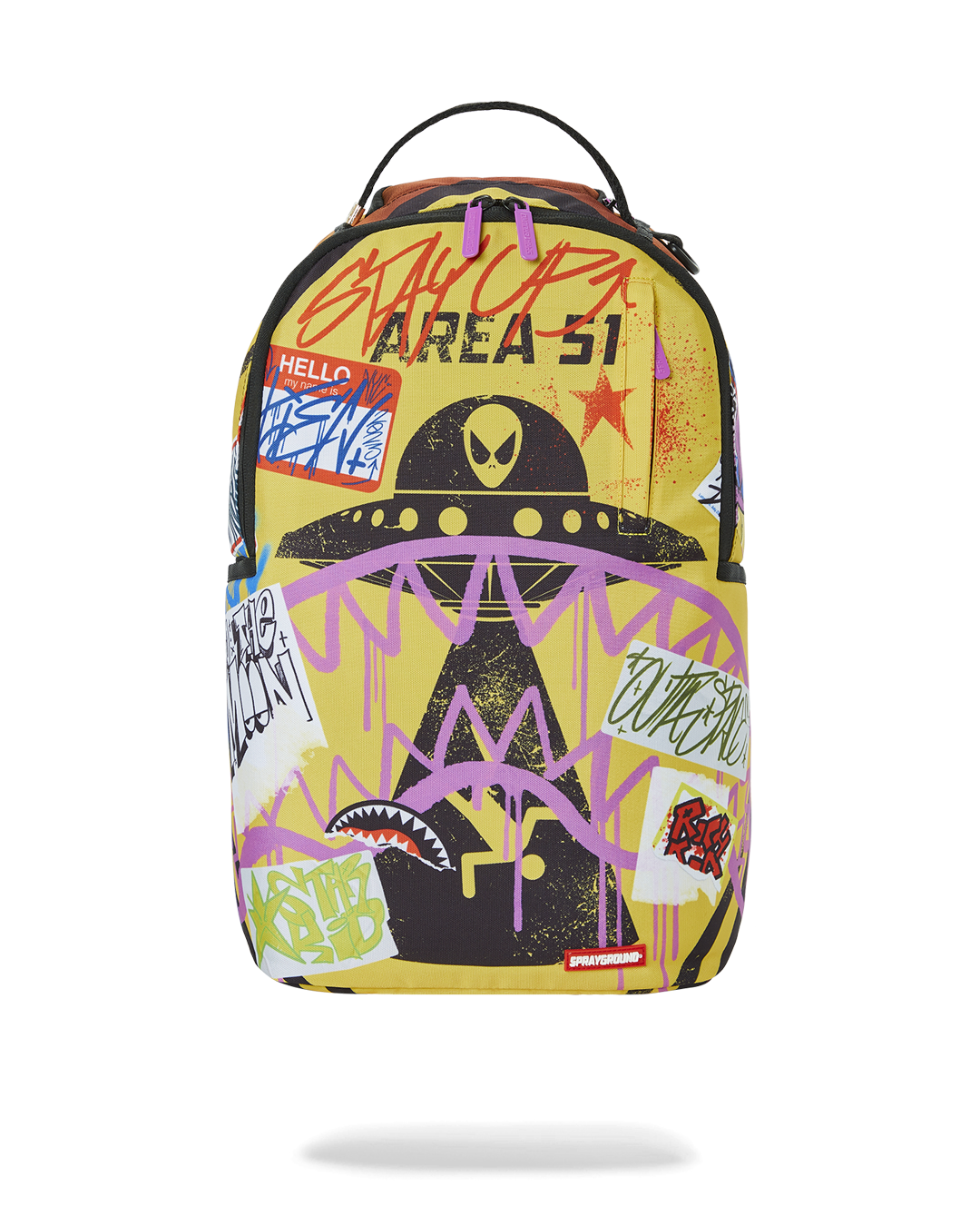 AREA SG designer backpack worn crossbody in a city environment, showcasing its compact profile and side pockets.