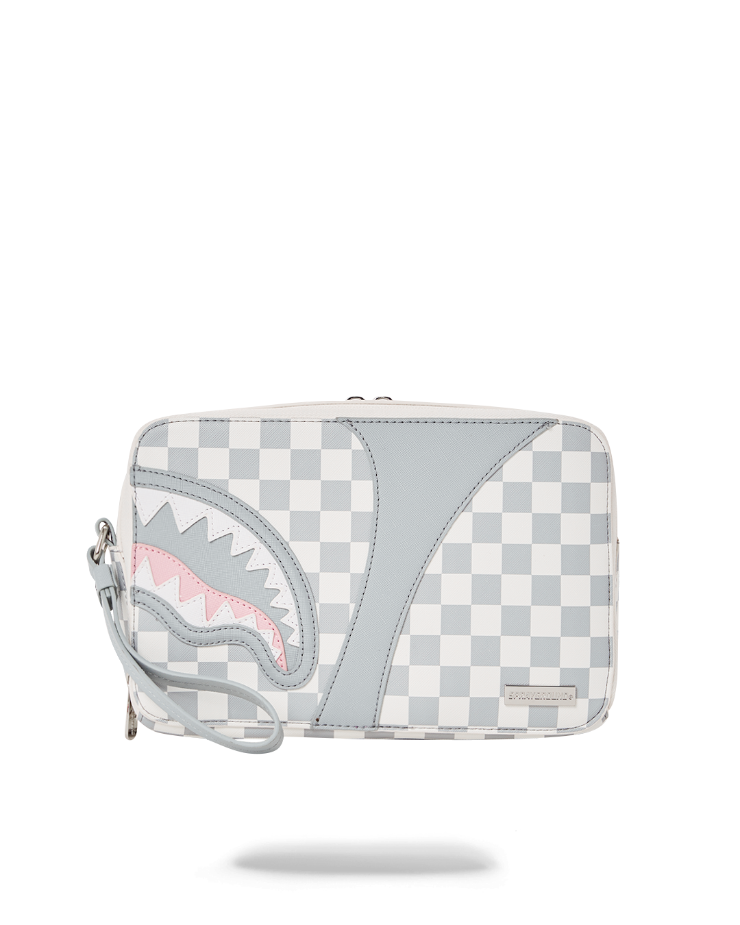 Close-up view of black toiletry bag open showing organized compartments for daily essentials