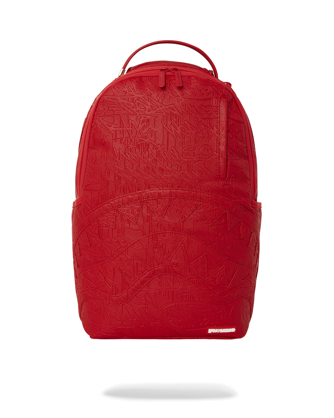 Front view of graffiti-style backpack resting on park bench