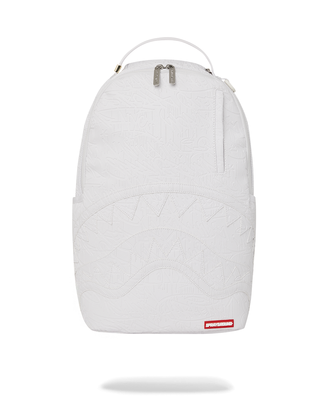 Front angle of graffiti backpack showing gold zippers and faux leather texture