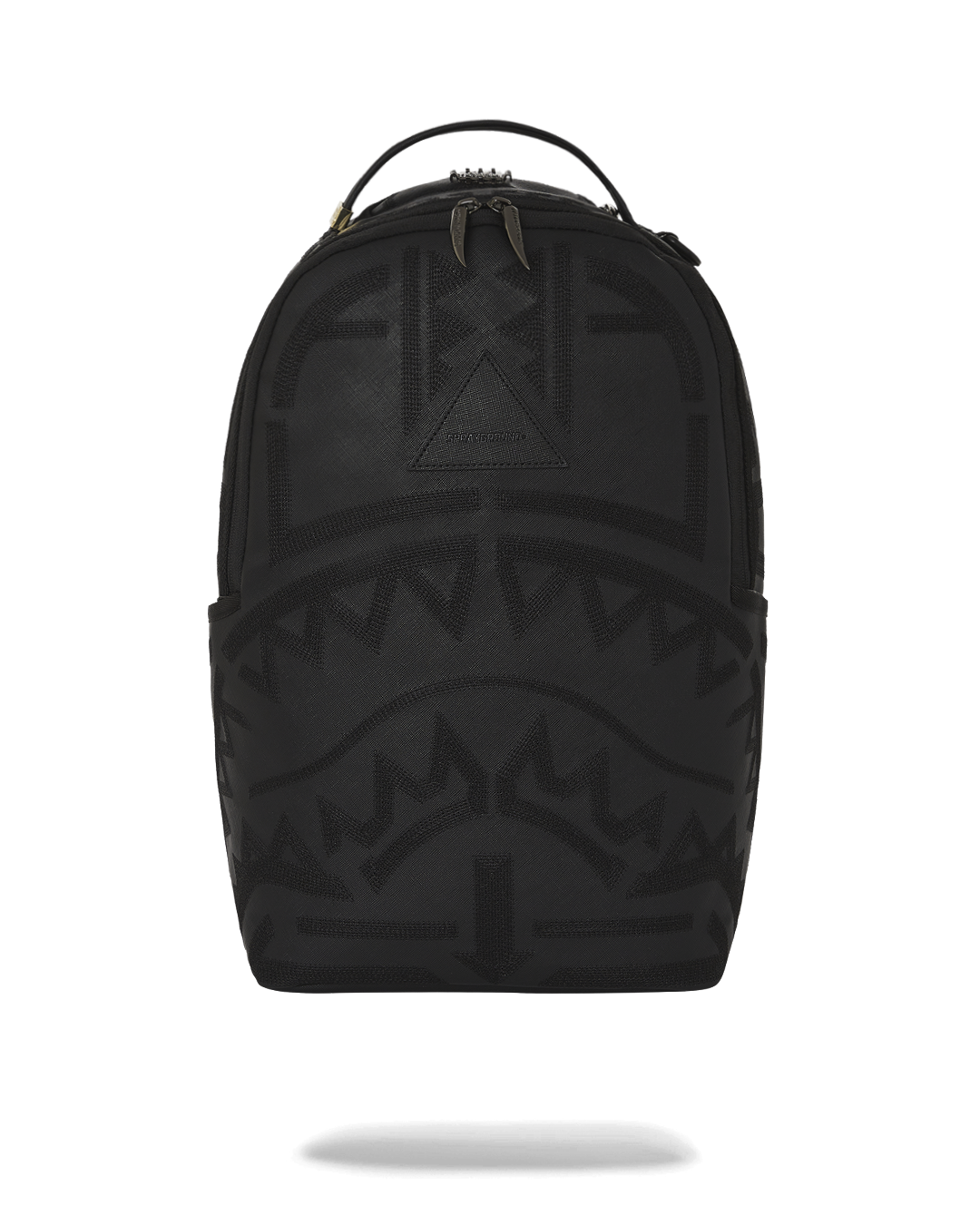 Topo Designs luxury travel backpack with metallic embroidery and front zipper pocket.