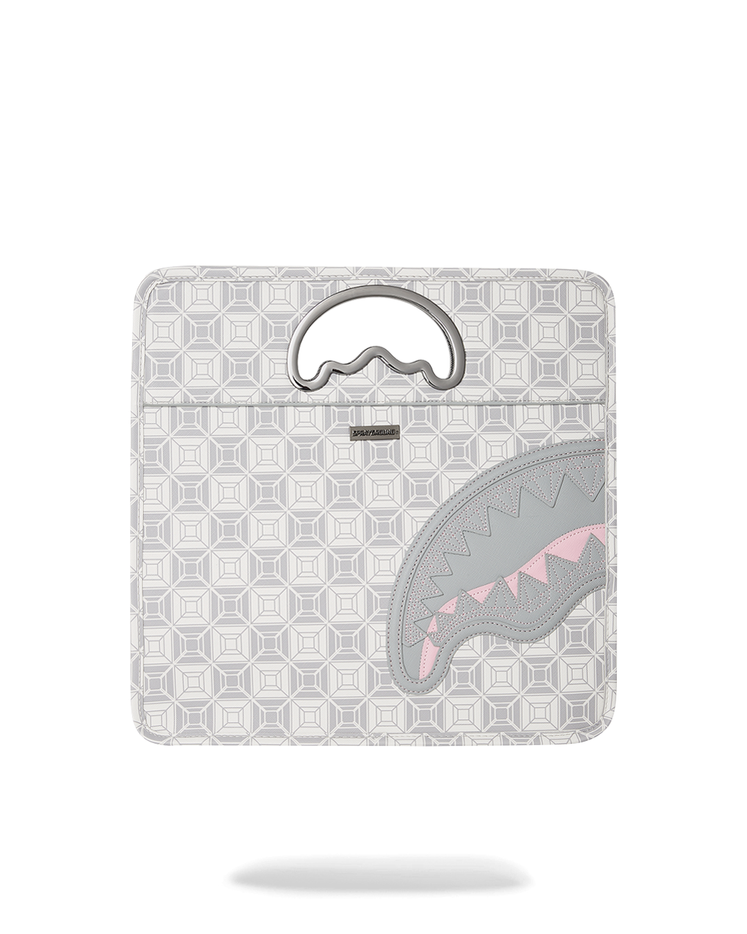 Angled closeup of designer handbag featuring shark handle and magnetic closure