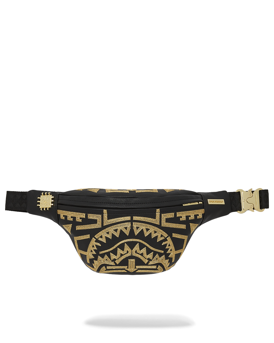 Close-up of the Savvy Crossbody Travel Bag's gold thread embroidery and hardware.