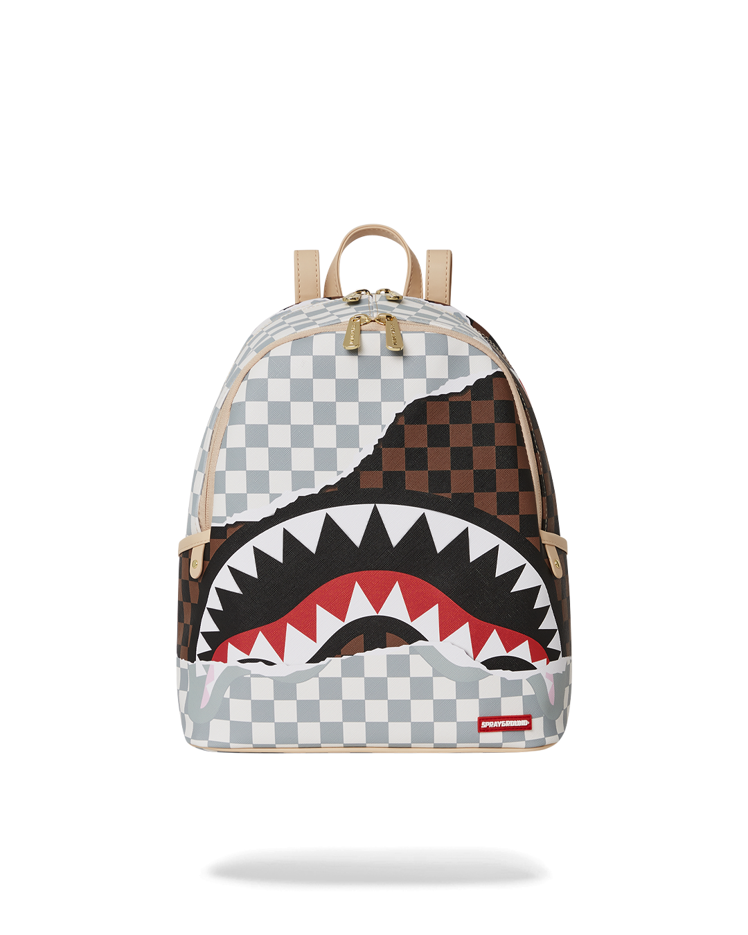 Savage backpack open showing interior compartments at coffee shop