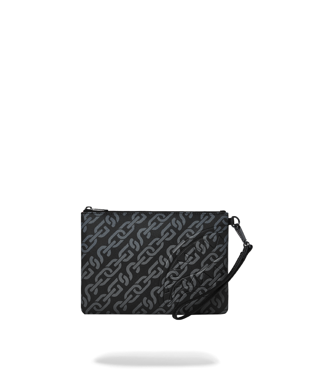 Faux leather clutch being used as a wristlet at a formal event