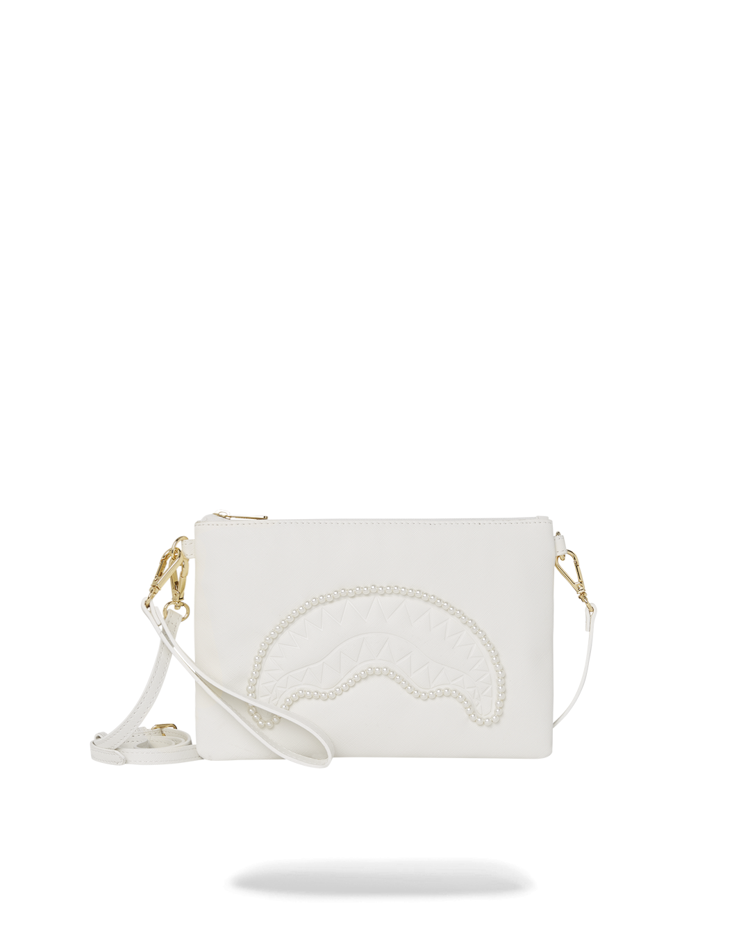 Front view of pearl-clutch with sharkmouth detailing, held in hand