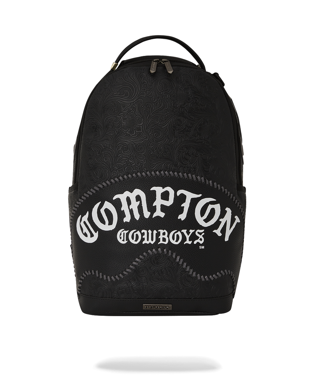 Compton Cowboys leather backpack purse slung over a shoulder, showcasing front pockets