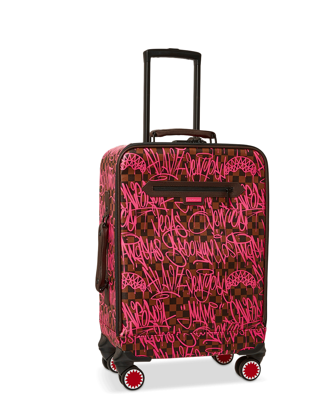 Side angle of faux leather spinner suitcase on sidewalk near coffee shop