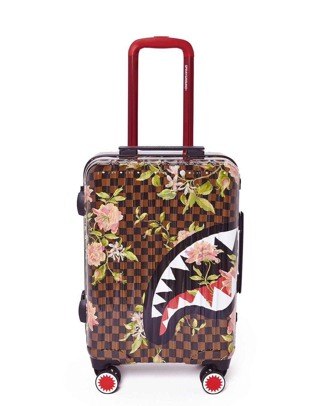 Sharkflower 21.5-inch hard shell carry-on luggage with spinner wheels on airport floor