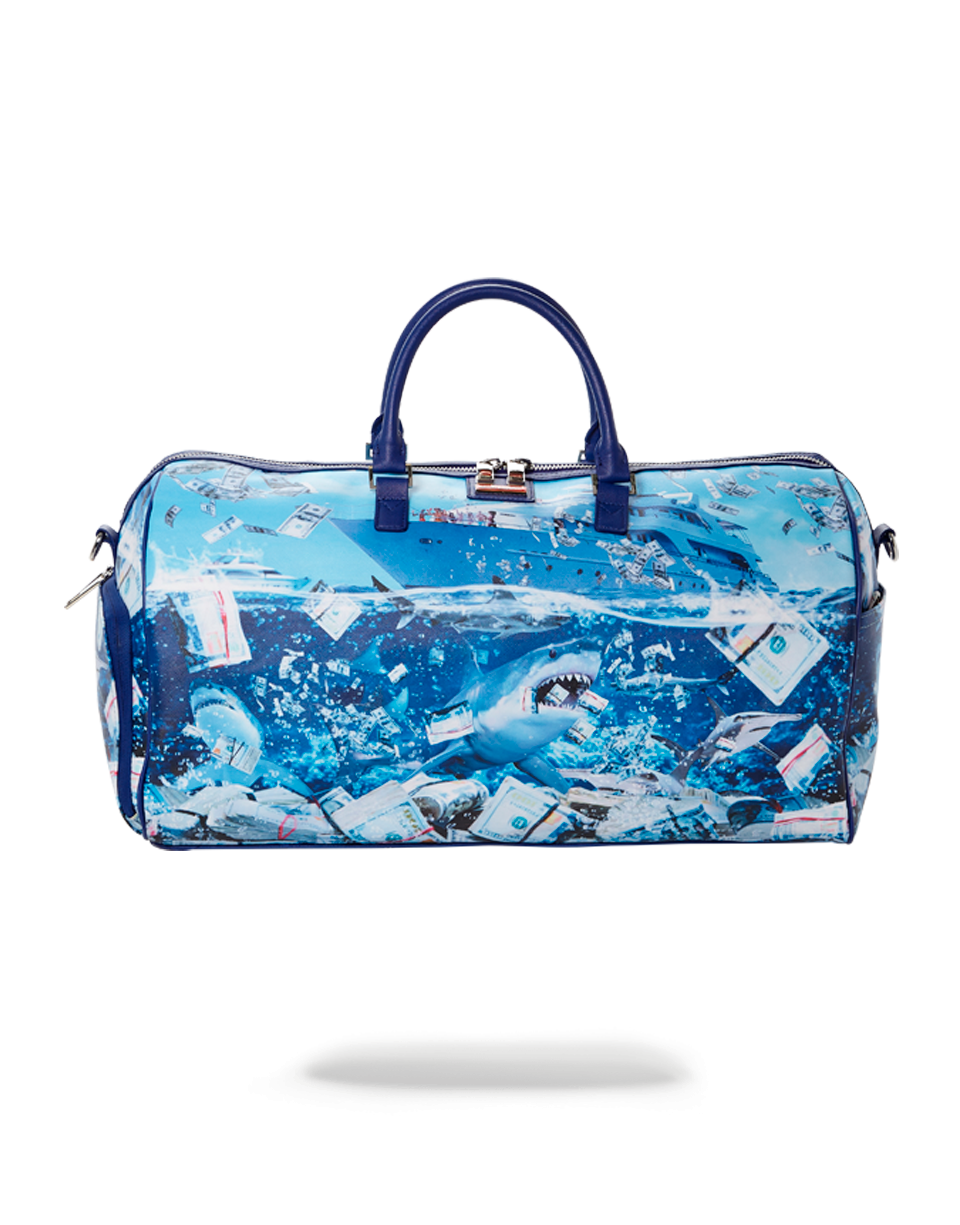 Front view of Shark Adventure Duffle Bag with zippered pockets.