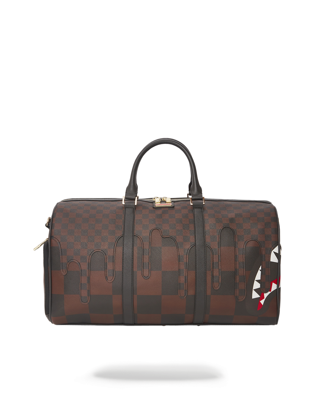 Angled view of leather duffle bag on city sidewalk with sneaker pocket visible