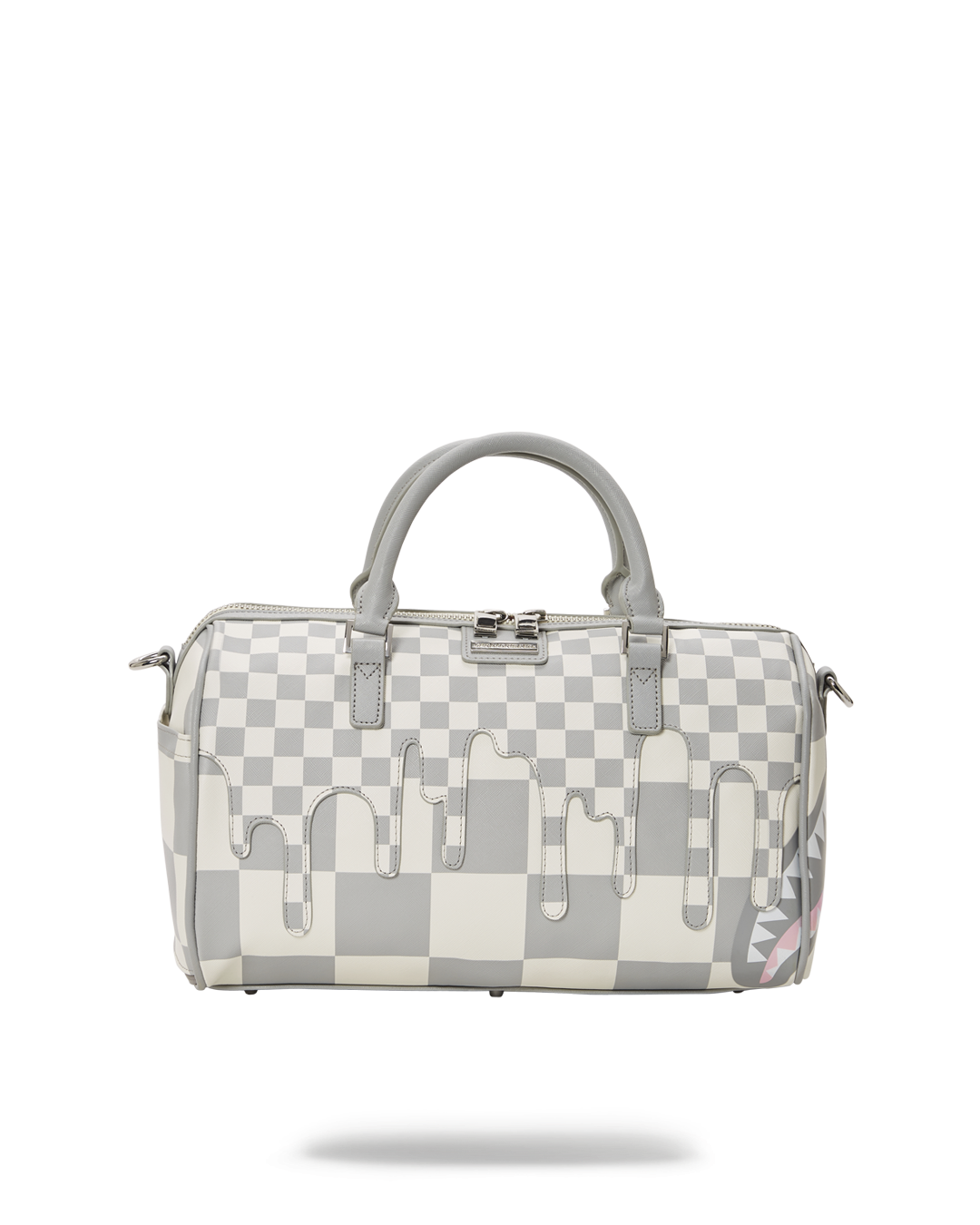 Palais mini duffle bag worn crossbody in urban setting