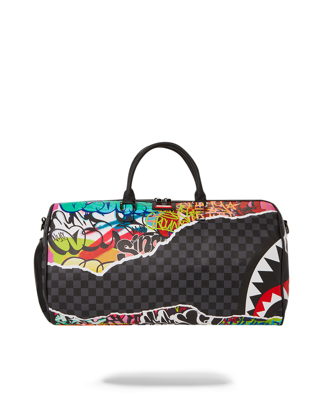 Water-resistant artistic duffle bag being carried through urban setting