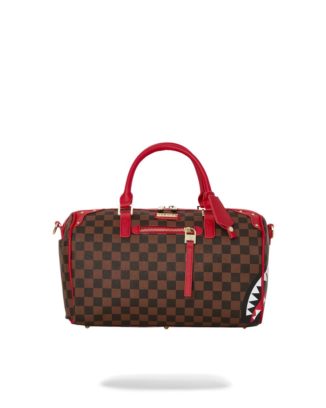 Close-up of the red-trimmed vegan leather mini duffle bag with gold hardware.
