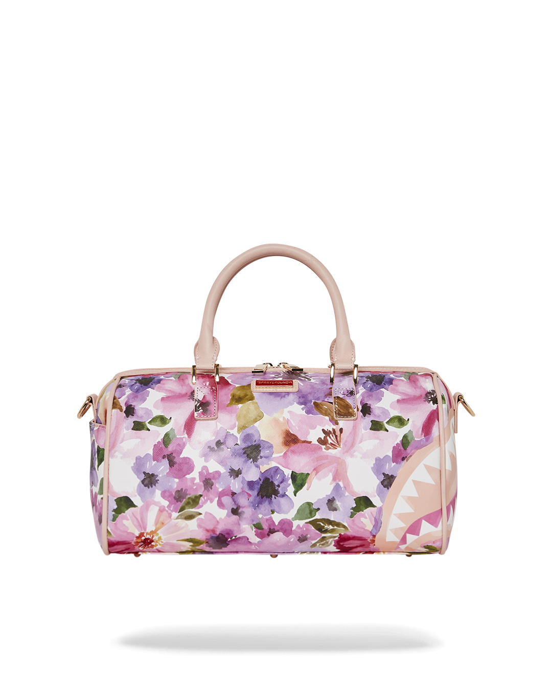 Close-up of chic faux leather mini duffle bag showcasing gold zippers.
