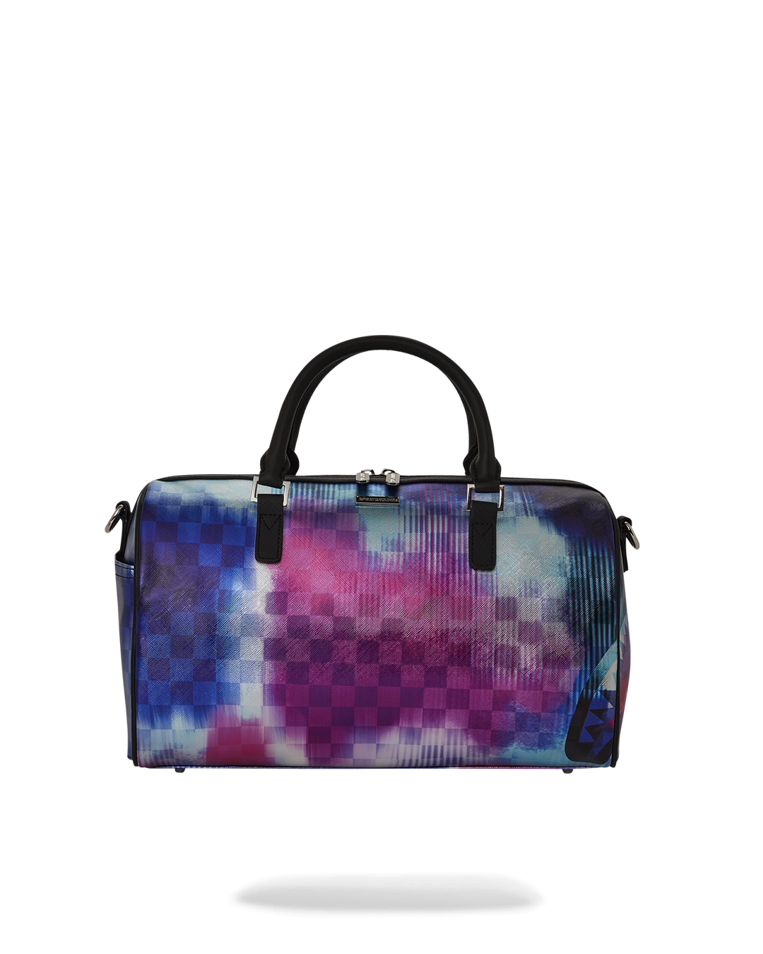 SharkClub mini duffle bag carried over the shoulder in a city setting