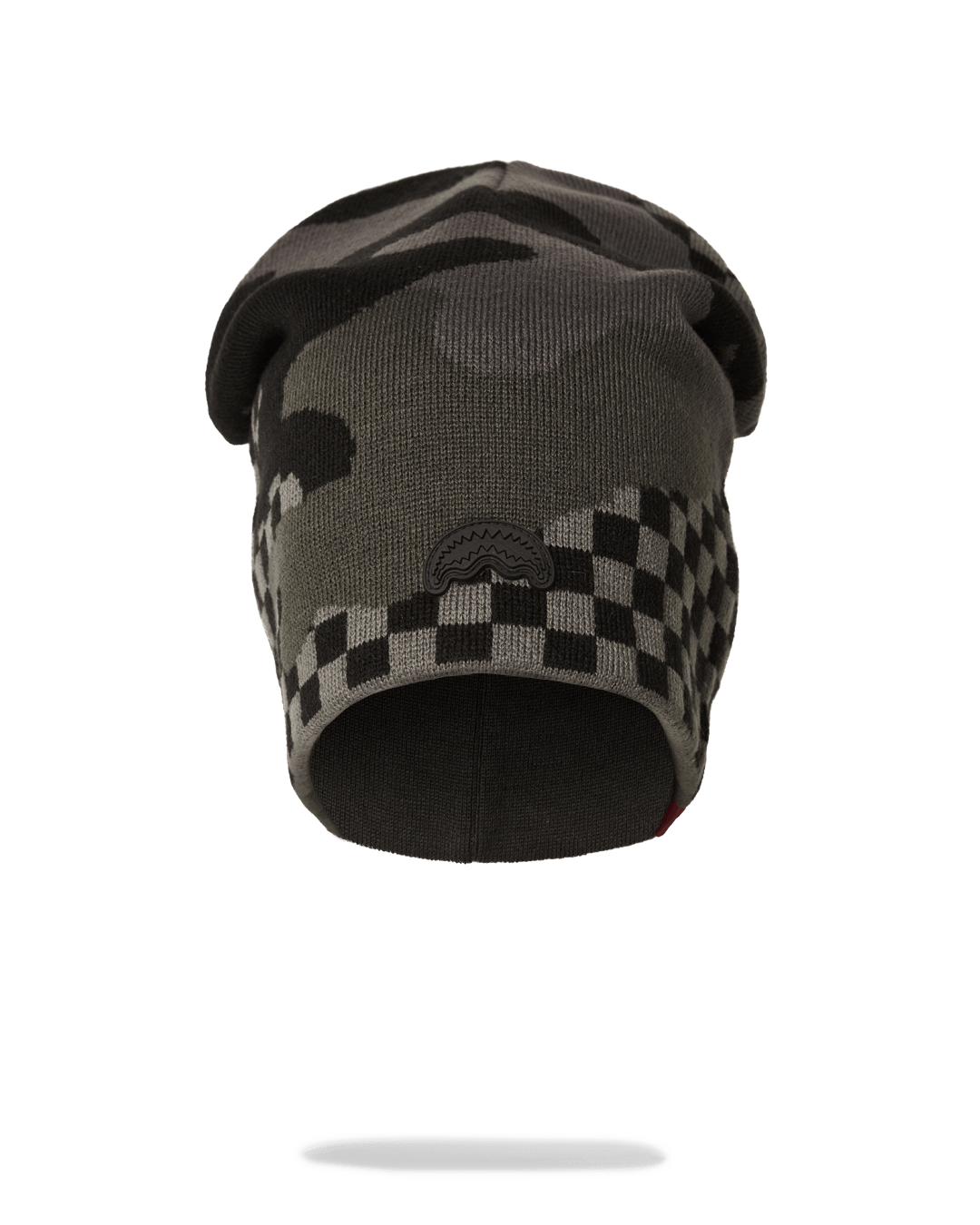 Sprayground slouch beanie displayed on a city street