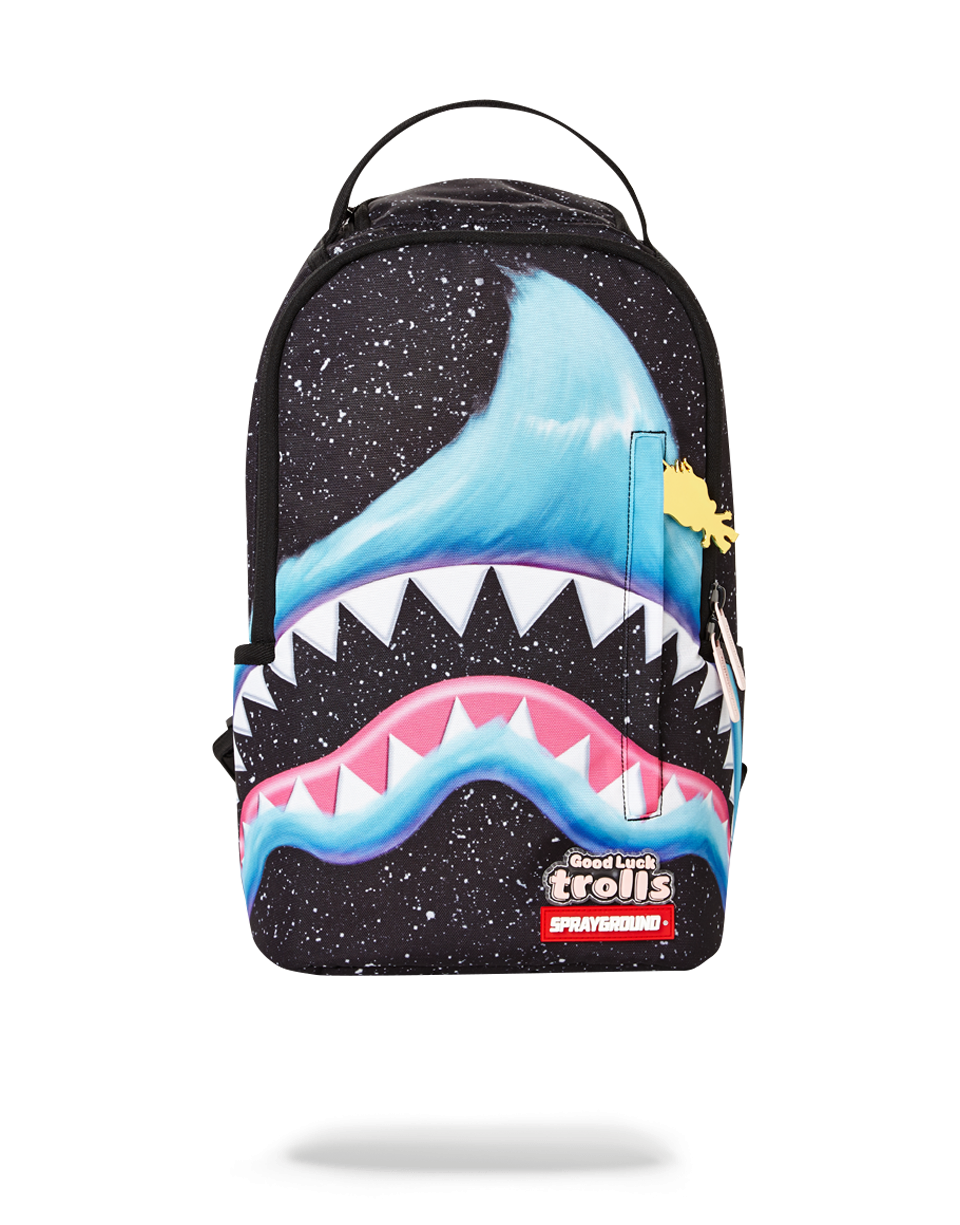 Fury Mini Backpack worn crossbody in an urban setting