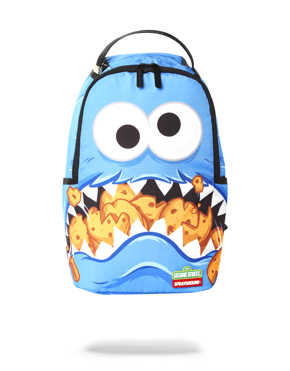 Front view of the Anime Cookie Monster Shark backpack, showcasing its vibrant design and side pockets.