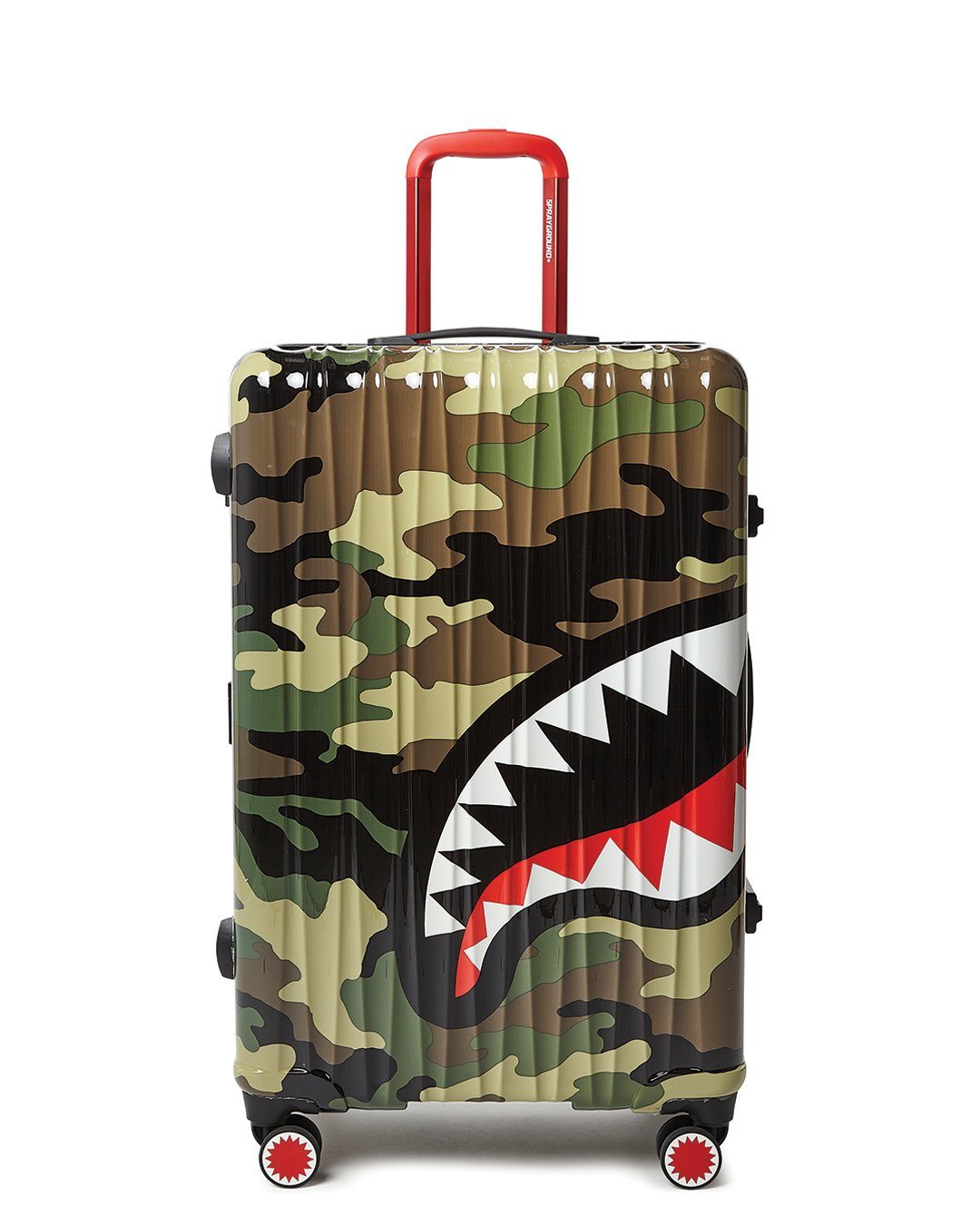 Close-up of Sharknautics camo hard shell suitcase with spinner wheels