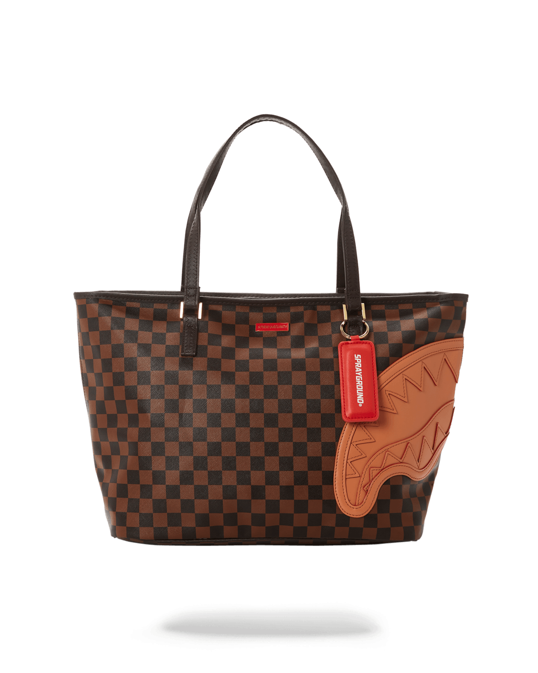 Front view of the Henny Tote showing printed exterior and gold zippers