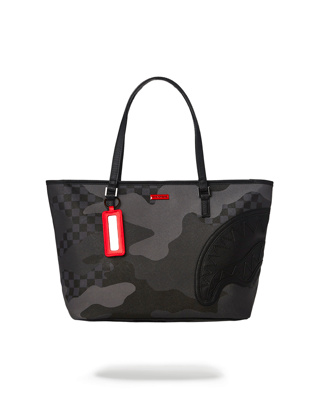 Close-up of the vegan leather tote showing water-resistant fabric and gold hardware