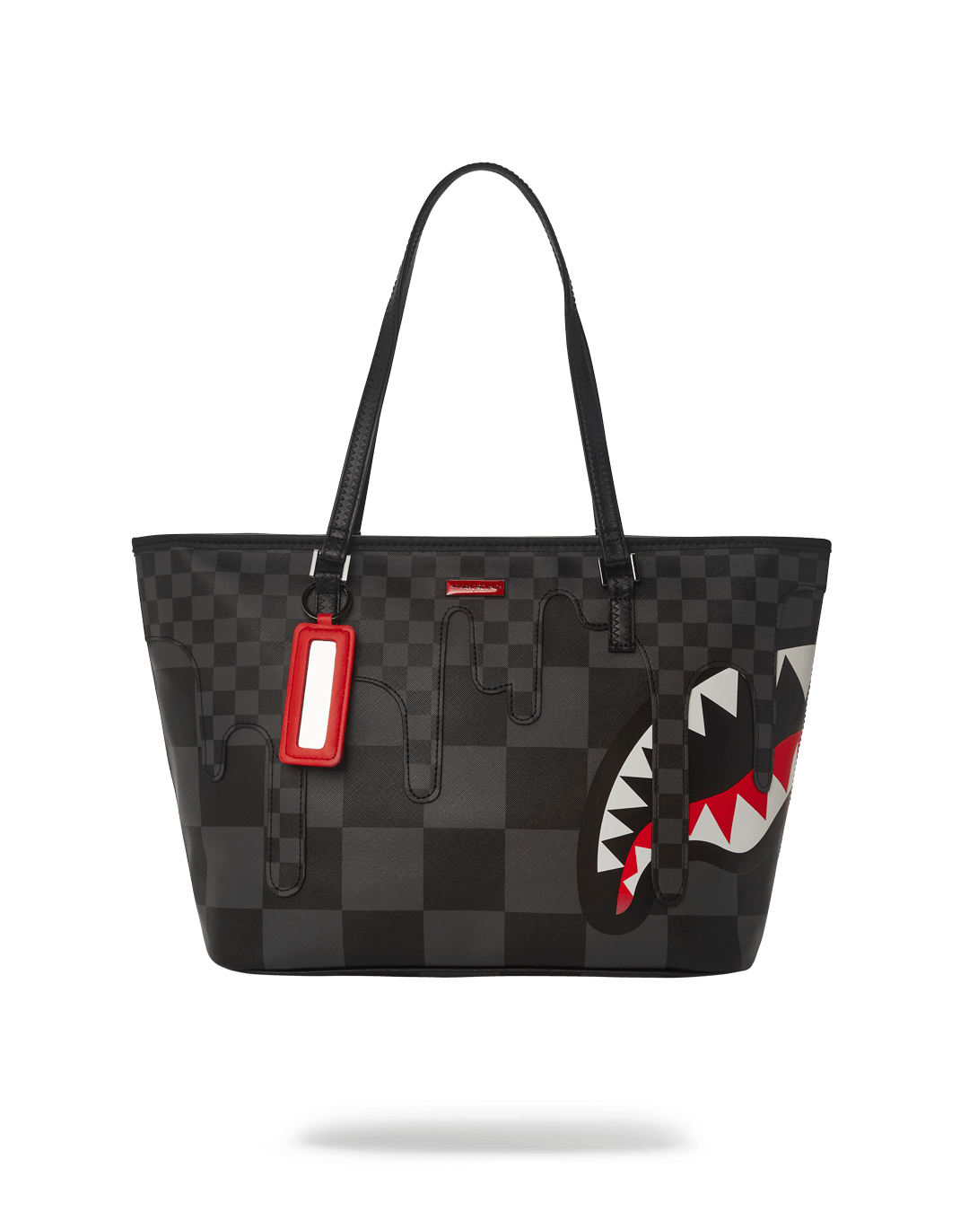 Side angle of grey Sprayground tote showing double handles and bold shark print