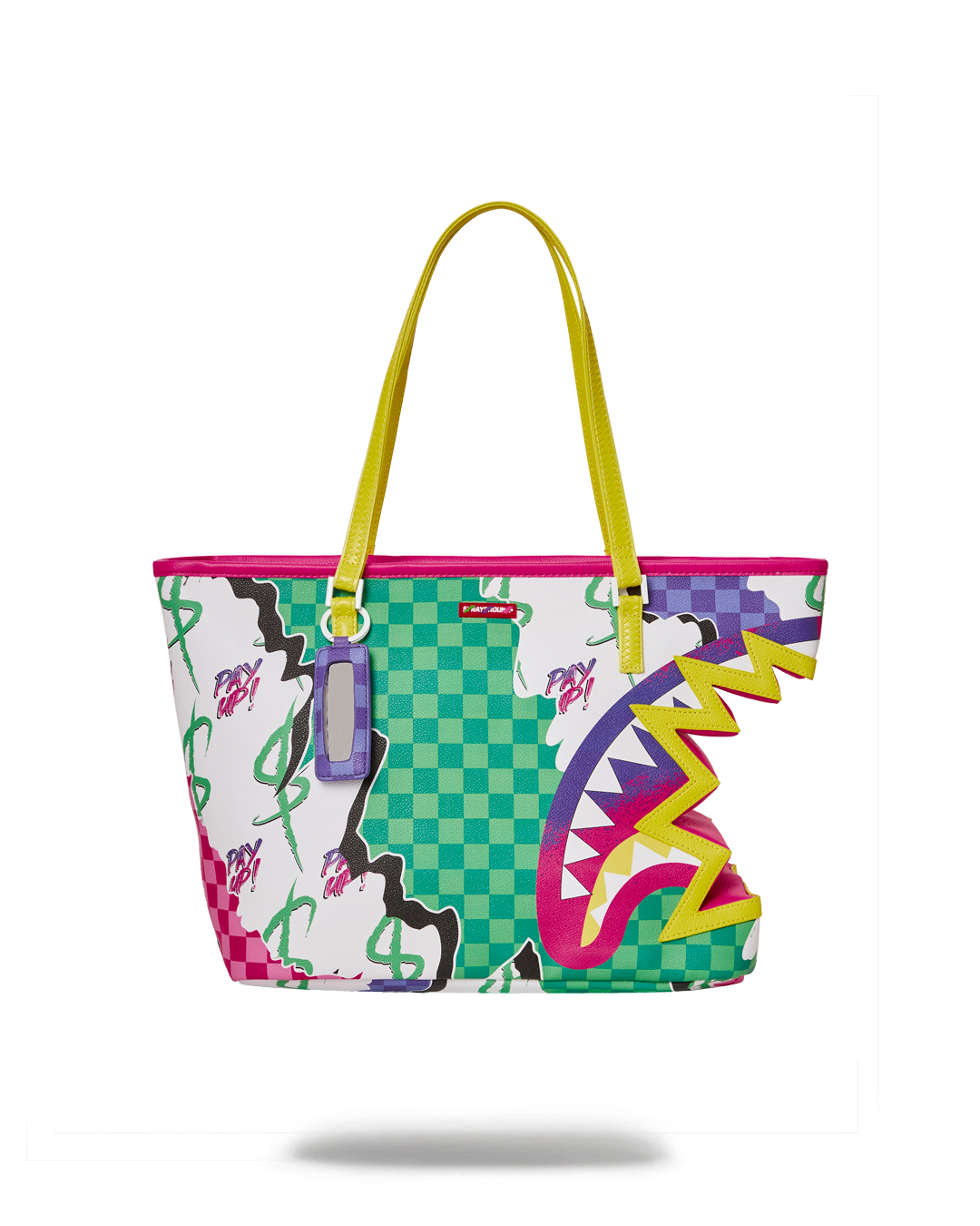 Vibrant vegan leather tote bag in a park setting, highlighting its unique print.