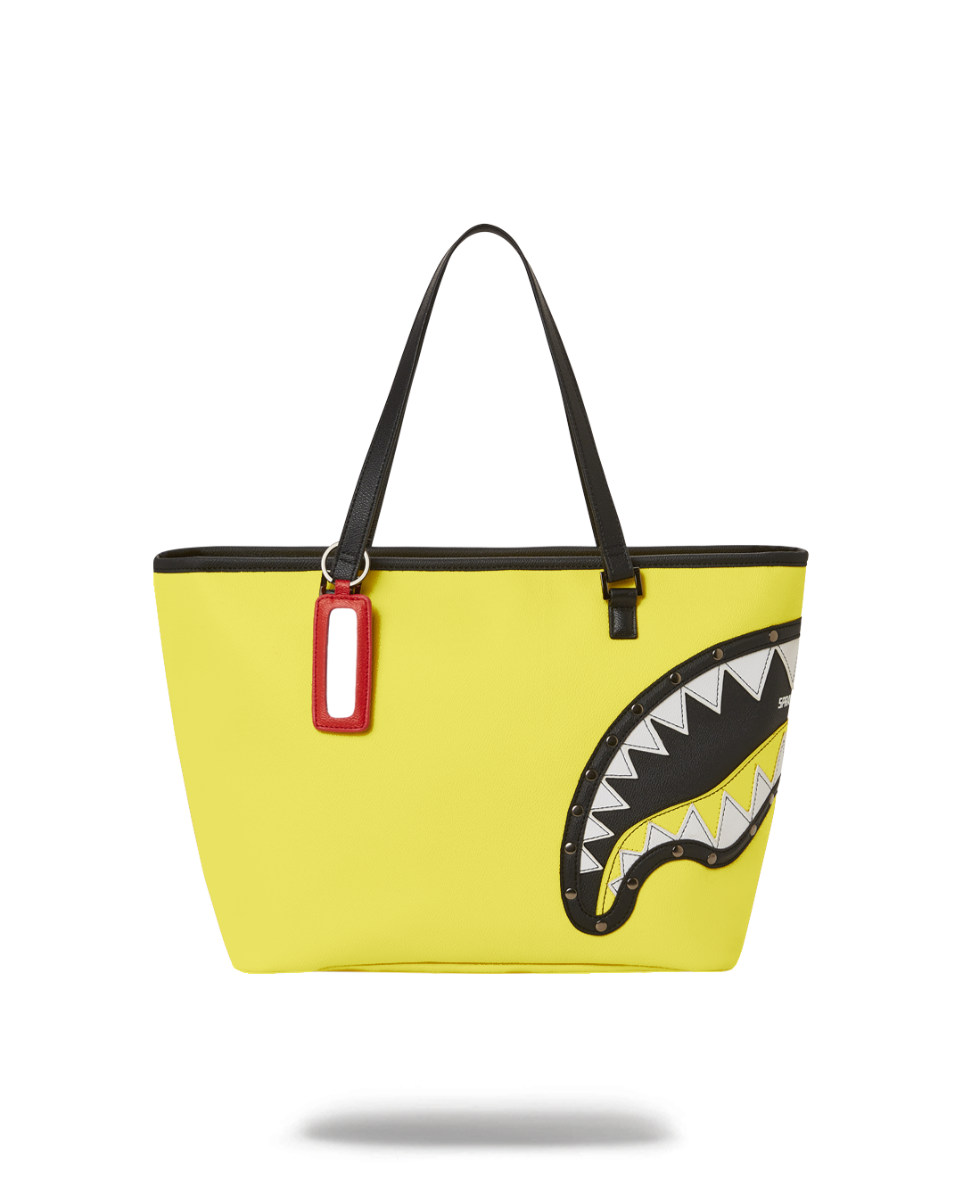 Vegan leather tote bag with printed design, showcasing its spacious interior and double handle.