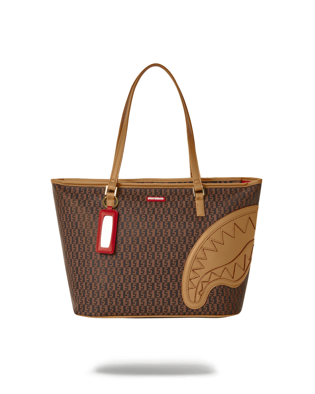 Close-up of the Sprayground vegan leather tote bag showing the unique print and gold zipper.