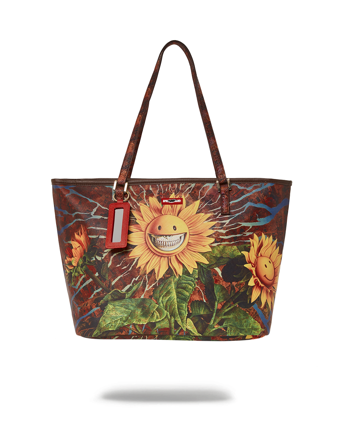 Ron English sunflower tote bag displayed outdoors with vibrant colors