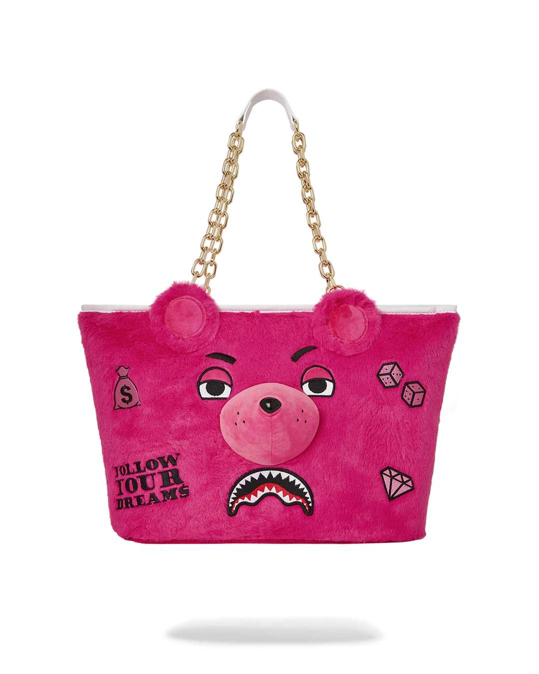 Chic pink plush tote bag with faux fur detail, perfect for outings.