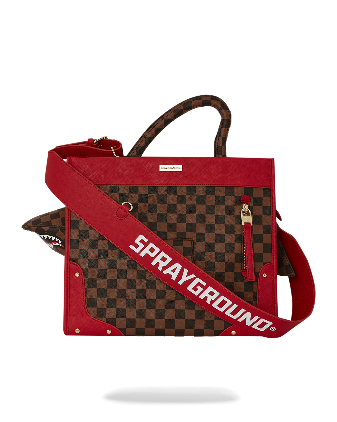 Sprayground Shark Tote in use, carried over the shoulder with the logo cross-body strap
