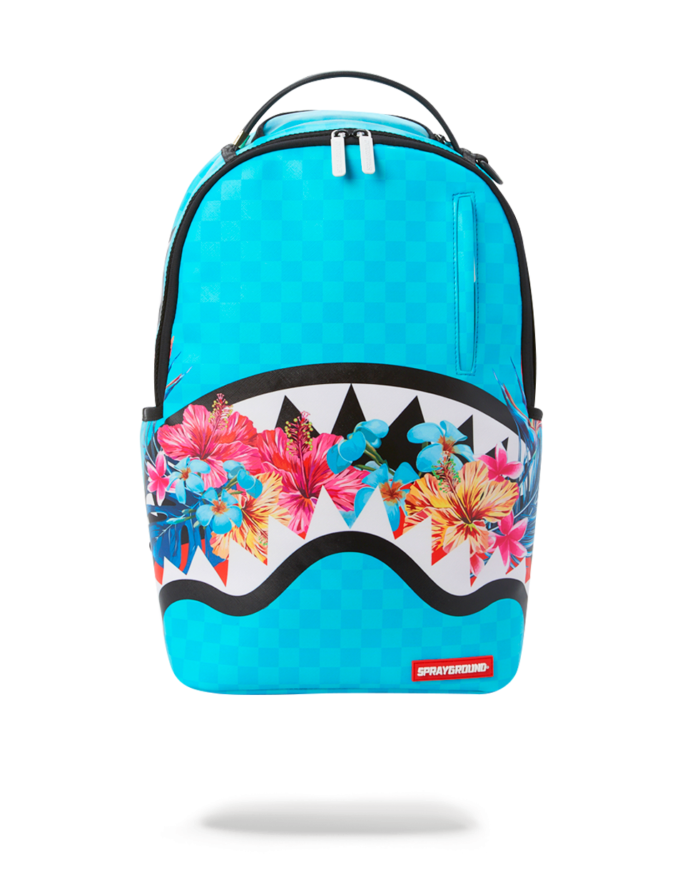 Side angle of Blossom Trek travel backpack showing sunglass pocket and mesh padding