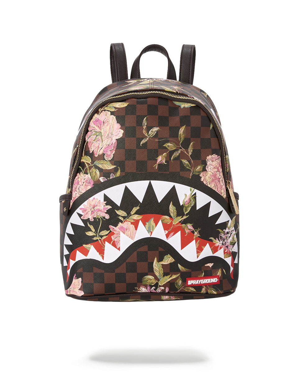 Front view of the vegan leather ladies backpack showing gold zippers and compact size